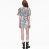 Abito in maglia con scollo a V e paillettes Abito in maglia con scollo a V e paillettes