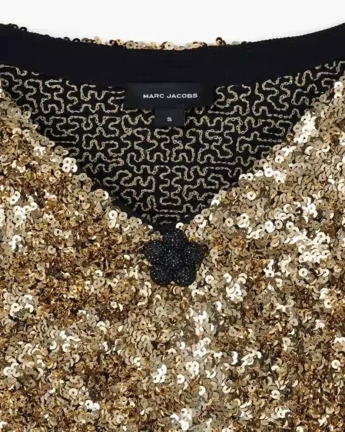 Abito in maglia con scollo a V e paillettes Abito in maglia con scollo a V e paillettes