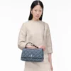 Borsa a tracolla convertibile in denim trapuntato