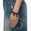 Bracciale con mini charm iconico pavé