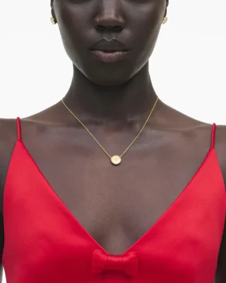 Collana con pendente a bottone
