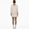Giacca da donna in tweed Giacca da donna in tweed