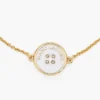 Il bracciale con catena a bottoni Il bracciale con catena a bottoni