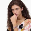 Il bracciale con ciondoli Trinket