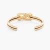 Il bracciale Dual Cuff Il bracciale Dual Cuff