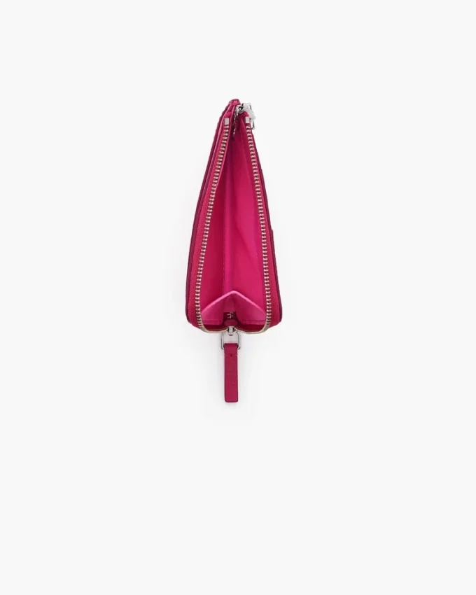 Il portafoglio multiuso in pelle con chiusura superiore a zip Il portafoglio multiuso in pelle con chiusura superiore a zip