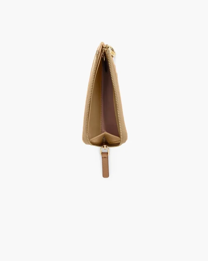 Il portafoglio multiuso in pelle con chiusura superiore a zip Il portafoglio multiuso in pelle con chiusura superiore a zip