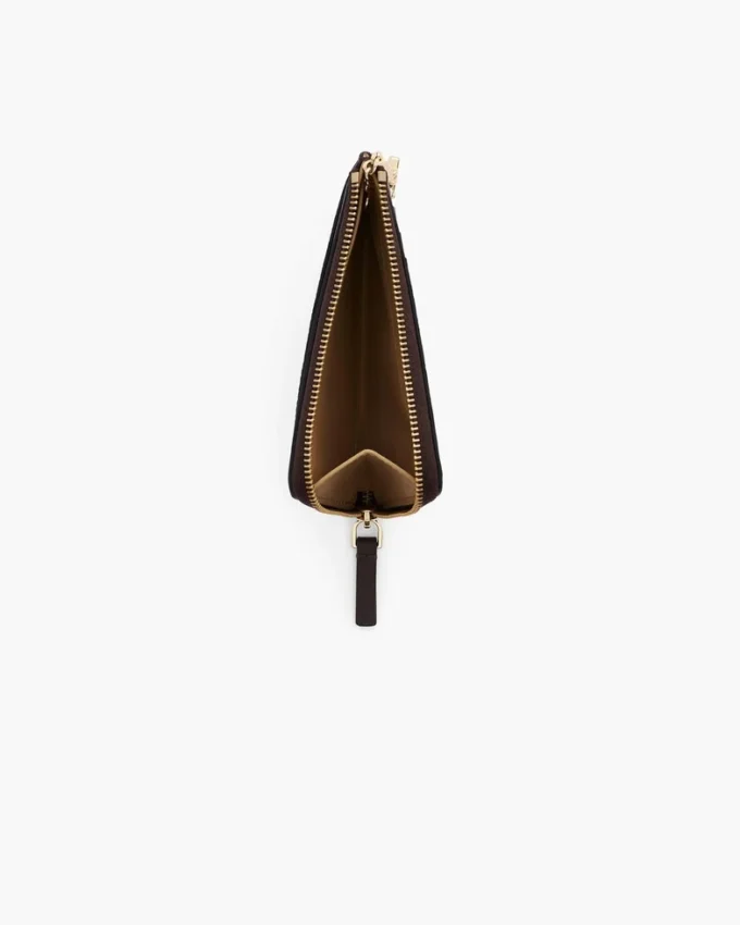 Il portafoglio multiuso in pelle con chiusura superiore a zip Il portafoglio multiuso in pelle con chiusura superiore a zip