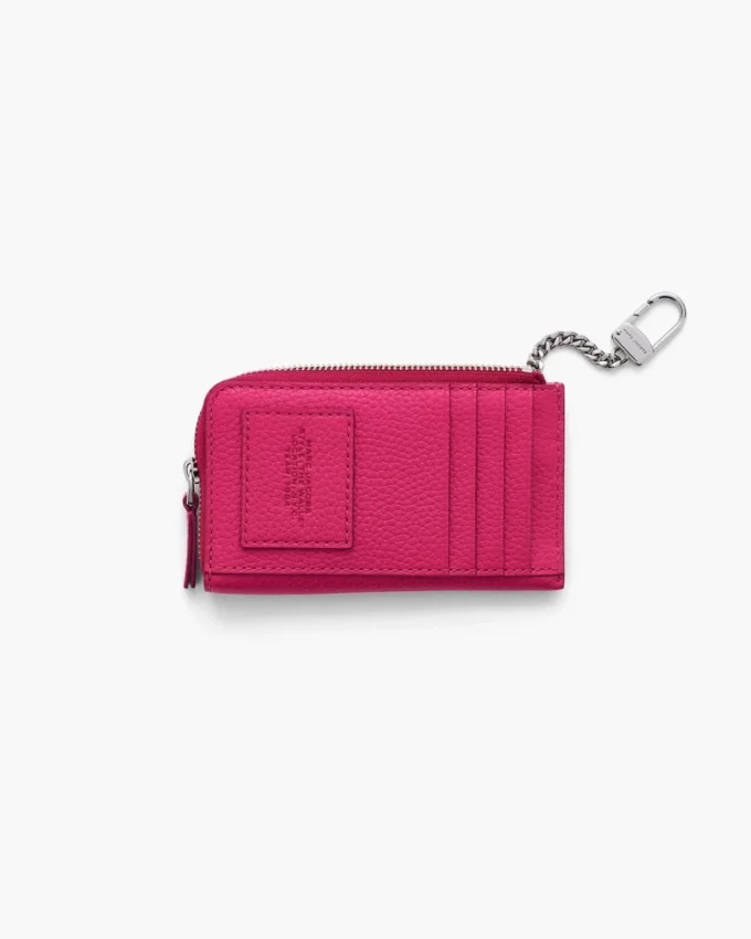 Il portafoglio multiuso in pelle con chiusura superiore a zip Il portafoglio multiuso in pelle con chiusura superiore a zip