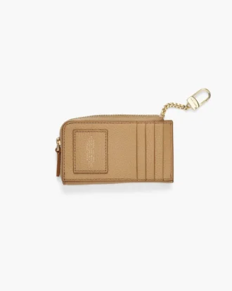 Il portafoglio multiuso in pelle con chiusura superiore a zip