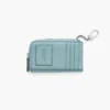 Il portafoglio multiuso in pelle con chiusura superiore a zip Il portafoglio multiuso in pelle con chiusura superiore a zip