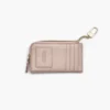 Il portafoglio multiuso in pelle con chiusura superiore a zip Il portafoglio multiuso in pelle con chiusura superiore a zip