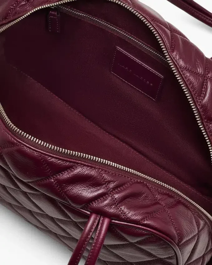 La borsa doppia in pelle trapuntata La borsa doppia in pelle trapuntata