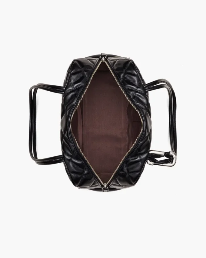 La borsa doppia in pelle trapuntata La borsa doppia in pelle trapuntata