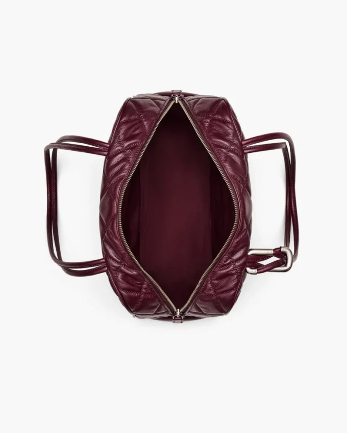 La borsa doppia in pelle trapuntata La borsa doppia in pelle trapuntata