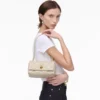 La mini borsa a doppia tracolla trapuntata La mini borsa a doppia tracolla trapuntata