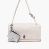Portamonete con chiusura superiore e charm glitterato rivestito