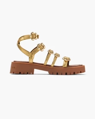 Sandalo gladiatore in pelle metallizzata con Daisy Sandalo gladiatore in pelle metallizzata con Daisy