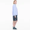 Sneaker alta in denim con margherite sequin Daisy Sneaker alta in denim con margherite sequin Daisy