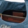 The A.P.C. X Marc Jacobs Sack Bag in denim The A.P.C. X Marc Jacobs Sack Bag in denim