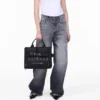 The Cargo Canvas Tote Bag media