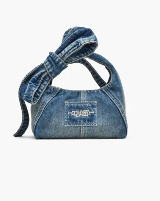 The Sack Bag mini in denim with a bow