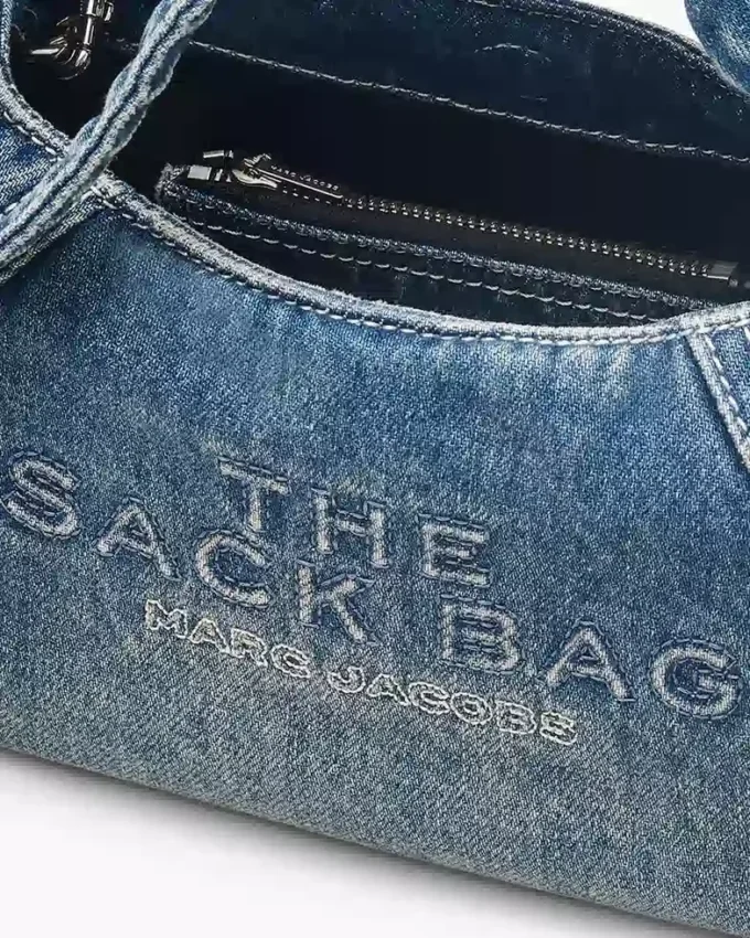 The Sack Bag mini in denim with a bow